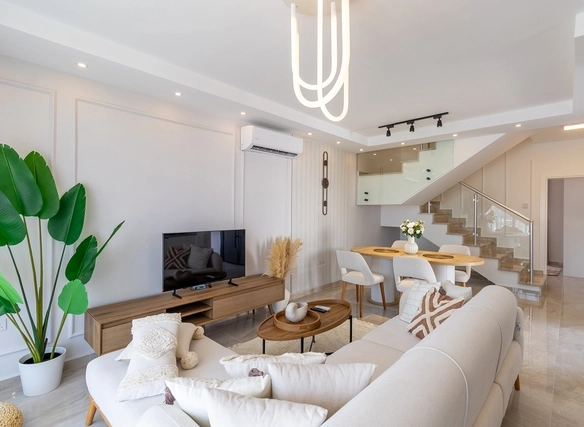 Modern 3-bedroom semi-detached villa in Caesar Cliff II featuring spacious interior layout, rooftop terrace, large balcony, contemporary kitchen, and stylish living areas within a luxury seaside residential project in North Cyprus.