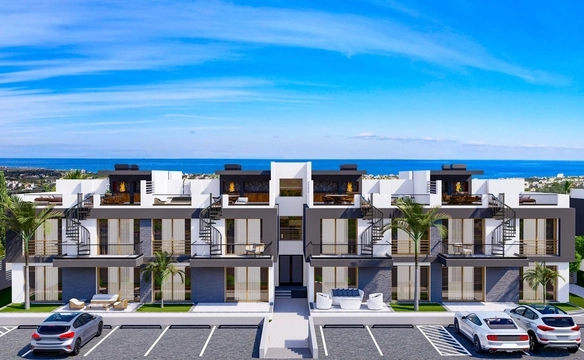 Modern 1-bedroom garden apartment in Spectra Project Lapta featuring stylish interior design, open-plan kitchen, spacious living area, and scenic mountain and pool views in North Cyprus.