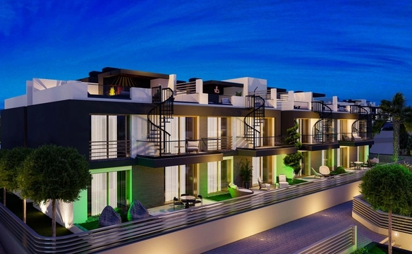 Modern 1-bedroom garden apartment in Spectra Project Lapta featuring stylish interior design, open-plan kitchen, spacious living area, and scenic mountain and pool views in North Cyprus.