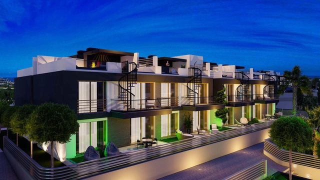 Modern 1-bedroom garden apartment in Spectra Project Lapta featuring stylish interior design, open-plan kitchen, spacious living area, and scenic mountain and pool views in North Cyprus.