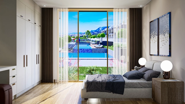 Modern 1-bedroom garden apartment in Spectra Project Lapta featuring stylish interior design, open-plan kitchen, spacious living area, and scenic mountain and pool views in North Cyprus.