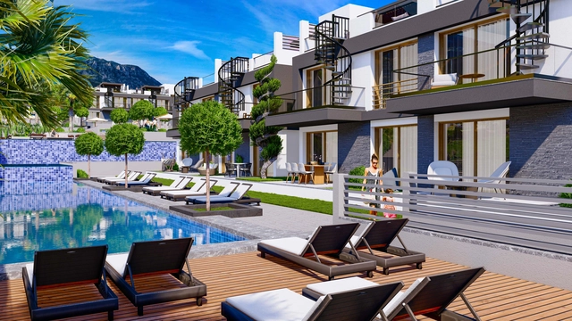 1_1+1 apart 6.jpg6 Modern 1-bedroom garden apartment in Spectra Project Lapta featuring stylish interior design, open-plan kitchen, spacious living area, and scenic mountain and pool views in North Cyprus.