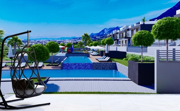 Modern 1-bedroom garden apartment in Spectra Project Lapta featuring stylish interior design, open-plan kitchen, spacious living area, and scenic mountain and pool views in North Cyprus.