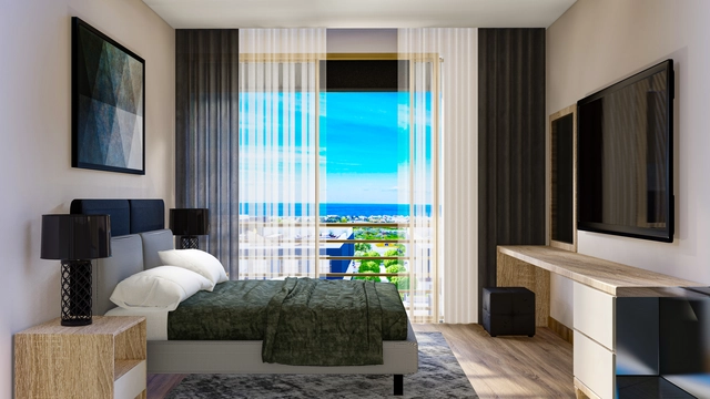 1_2+1 apart 5.jpg5 Modern 2-bedroom penthouse apartment in Spectra Project Lapta featuring stylish interior design, open-plan kitchen, spacious living area, and scenic mountain and pool views in North Cyprus.