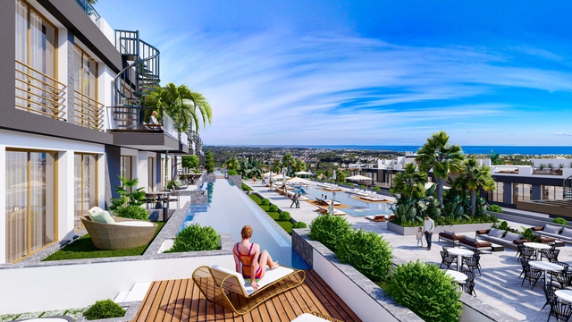 1_2+1 ve 3+1 havuzlu 2.jpg2 Modern 2-bedroom penthouse apartment in Spectra Project Lapta featuring stylish interior design, open-plan kitchen, spacious living area, and scenic mountain and pool views in North Cyprus.