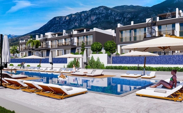 Modern townhouse Project in Lapta Kyrenia featuring stylish interior design, open-plan kitchen, spacious living area, and scenic mountain and pool views in North Cyprus.
