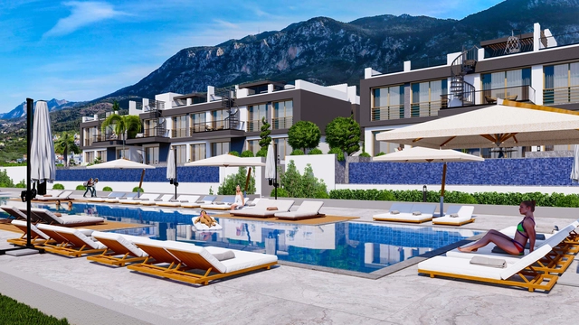 Modern townhouse Project in Lapta Kyrenia featuring stylish interior design, open-plan kitchen, spacious living area, and scenic mountain and pool views in North Cyprus.