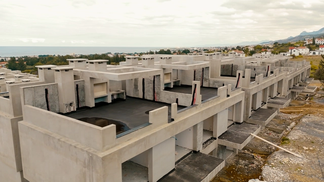 260220 spectra update.00_00_22_02.still013.jpg013 Modern townhouse Project in Lapta Kyrenia featuring stylish interior design, open-plan kitchen, spacious living area, and scenic mountain and pool views in North Cyprus.