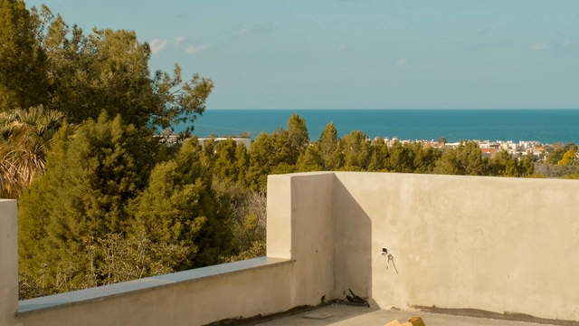 260220 spectra update.00_00_33_09.still022.jpg022 Modern townhouse Project in Lapta Kyrenia featuring stylish interior design, open-plan kitchen, spacious living area, and scenic mountain and pool views in North Cyprus.