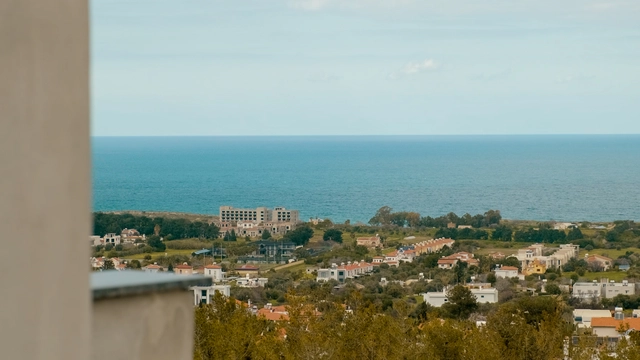 260220 spectra update.00_01_04_22.still045.jpg045 Modern townhouse Project in Lapta Kyrenia featuring stylish interior design, open-plan kitchen, spacious living area, and scenic mountain and pool views in North Cyprus.