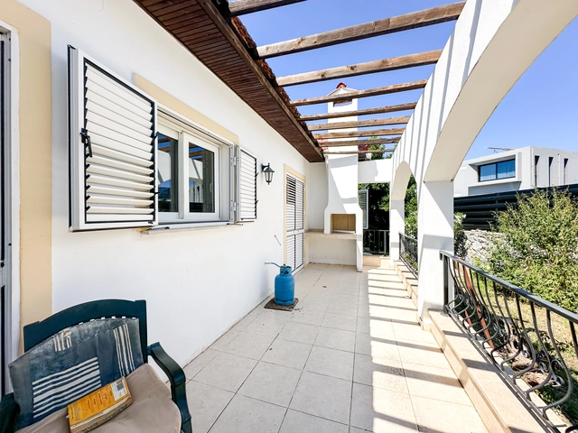 4-bedroom bungalow in Lapta Kyrenia with private swimming pool, garden, outdoor seating area, and detached single-level home with ready title deed in North Cyprus