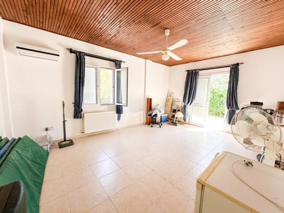 4-bedroom bungalow in Lapta Kyrenia with private swimming pool, garden, outdoor seating area, and detached single-level home with ready title deed in North Cyprus