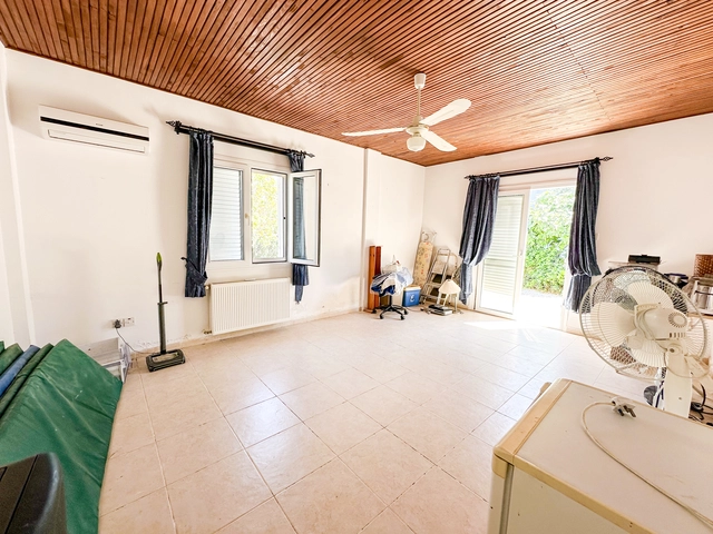 4-bedroom bungalow in Lapta Kyrenia with private swimming pool, garden, outdoor seating area, and detached single-level home with ready title deed in North Cyprus