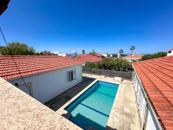 4-bedroom bungalow in Lapta Kyrenia with private swimming pool, garden, outdoor seating area, and detached single-level home with ready title deed in North Cyprus