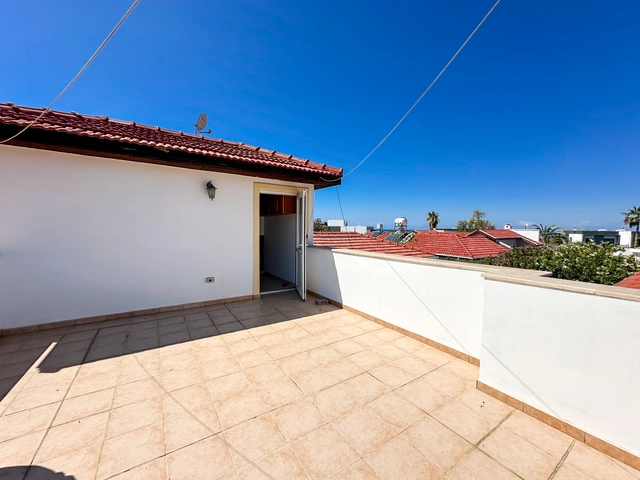 4-bedroom bungalow in Lapta Kyrenia with private swimming pool, garden, outdoor seating area, and detached single-level home with ready title deed in North Cyprus