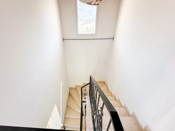 4-bedroom bungalow in Lapta Kyrenia with private swimming pool, garden, outdoor seating area, and detached single-level home with ready title deed in North Cyprus