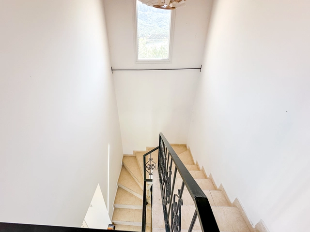 4-bedroom bungalow in Lapta Kyrenia with private swimming pool, garden, outdoor seating area, and detached single-level home with ready title deed in North Cyprus