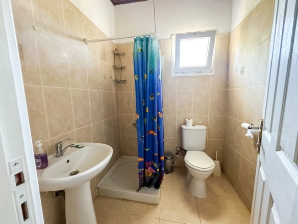 4-bedroom bungalow in Lapta Kyrenia with private swimming pool, garden, outdoor seating area, and detached single-level home with ready title deed in North Cyprus