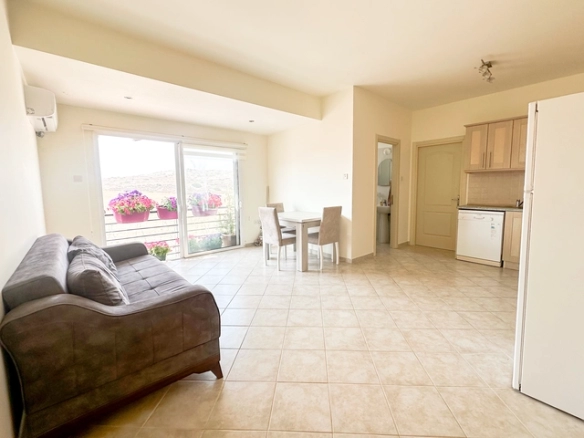 1 bedroom furnished apartment for sale in Boaz Iskele North Cyprus near Long Beach with pool complex.