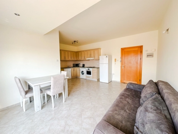 1 bedroom furnished apartment for sale in Boaz Iskele North Cyprus near Long Beach with pool complex.