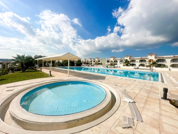 1 bedroom furnished apartment for sale in Boaz Iskele North Cyprus near Long Beach with pool complex.