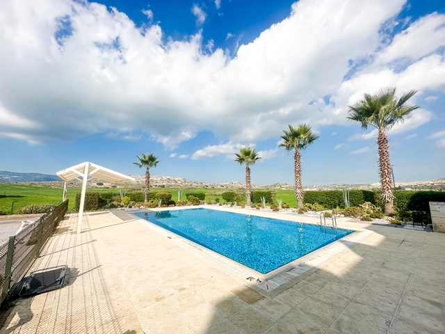 1 bedroom furnished apartment for sale in Boaz Iskele North Cyprus near Long Beach with pool complex.