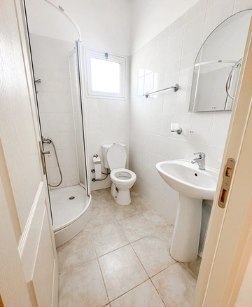 1 bedroom furnished apartment for sale in Boaz Iskele North Cyprus near Long Beach with pool complex.