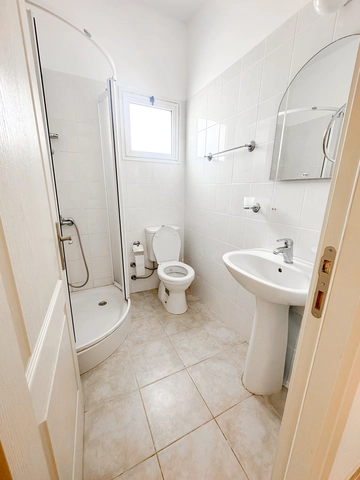 1 bedroom furnished apartment for sale in Boaz Iskele North Cyprus near Long Beach with pool complex.