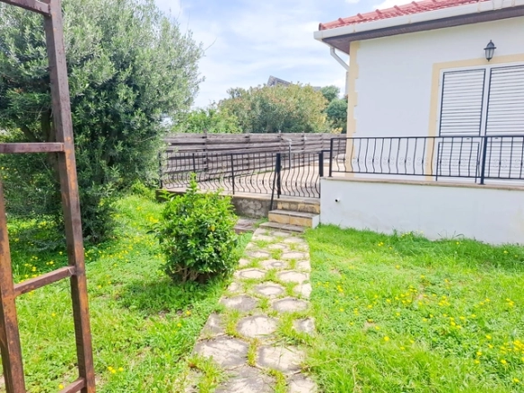 4-bedroom bungalow in Lapta Kyrenia with private swimming pool, garden, outdoor seating area, and detached single-level home with ready title deed in North Cyprus