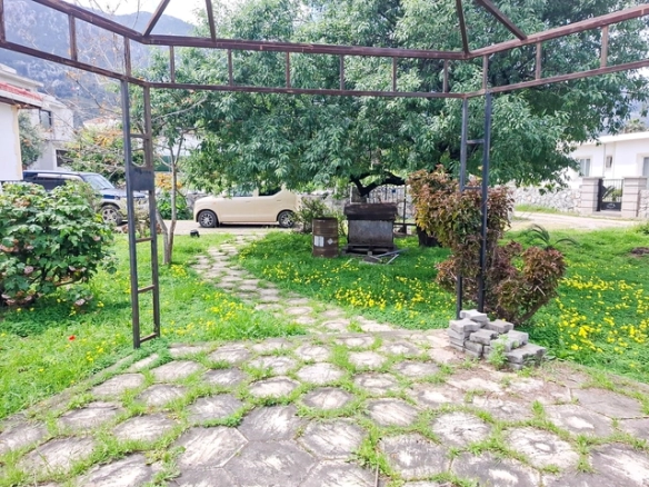 4-bedroom bungalow in Lapta Kyrenia with private swimming pool, garden, outdoor seating area, and detached single-level home with ready title deed in North Cyprus