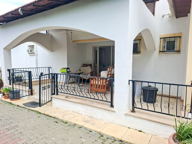 4-bedroom bungalow in Lapta Kyrenia with private swimming pool, garden, outdoor seating area, and detached single-level home with ready title deed in North Cyprus