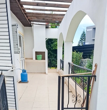 4-bedroom bungalow in Lapta Kyrenia with private swimming pool, garden, outdoor seating area, and detached single-level home with ready title deed in North Cyprus