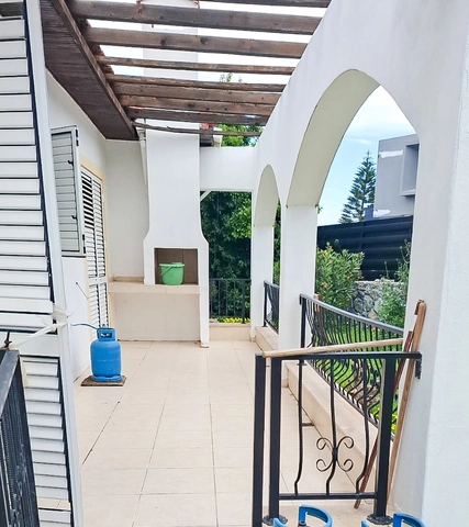 4-bedroom bungalow in Lapta Kyrenia with private swimming pool, garden, outdoor seating area, and detached single-level home with ready title deed in North Cyprus