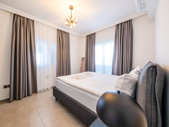 Fully furnished 3 bedroom garden villa apartment in Esentepe North Cyprus with resort facilities and swimming pools