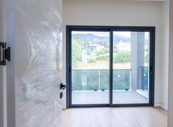 Three-bedroom semi-detached duplex villa with communal pool in Alsancak Yeşiltepe, Kyrenia, North Cyprus.