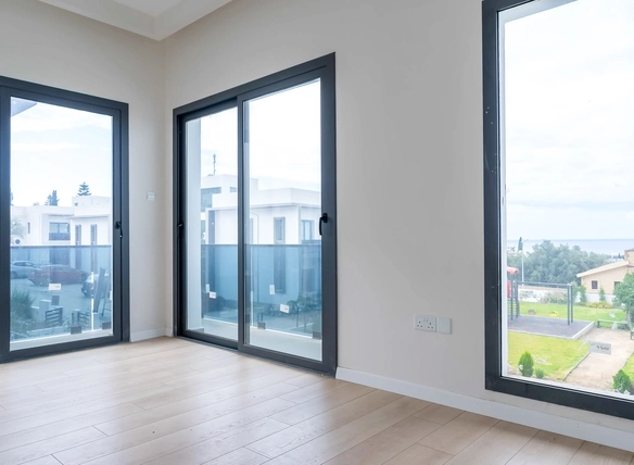 Three-bedroom semi-detached duplex villa with communal pool in Alsancak Yeşiltepe, Kyrenia, North Cyprus.