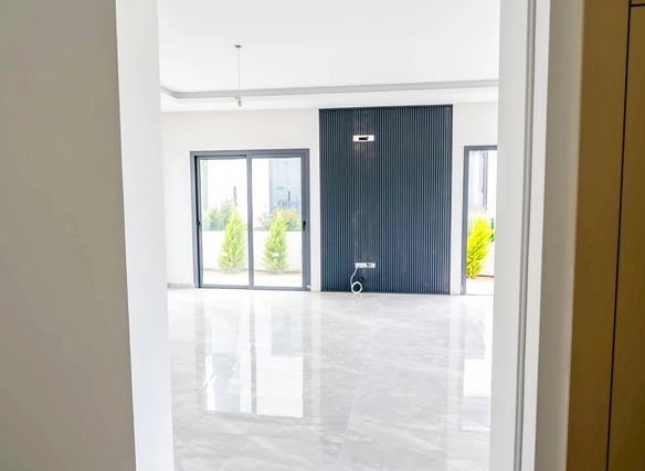 Three-bedroom semi-detached duplex villa with communal pool in Alsancak Yeşiltepe, Kyrenia, North Cyprus.