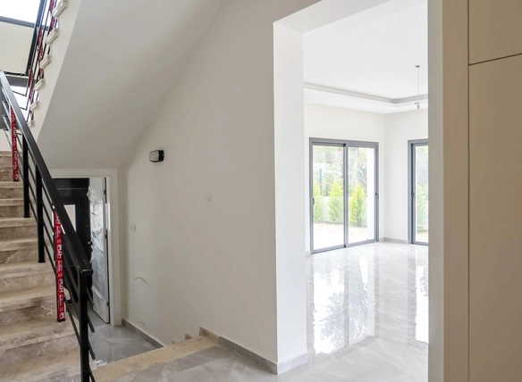 Three-bedroom semi-detached duplex villa with communal pool in Alsancak Yeşiltepe, Kyrenia, North Cyprus.