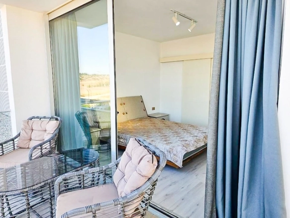 Fully furnished 2 bedroom apartment for sale Bogaz, Iskele, North Cyprus with mountain views, pools and walking distance to the beach.