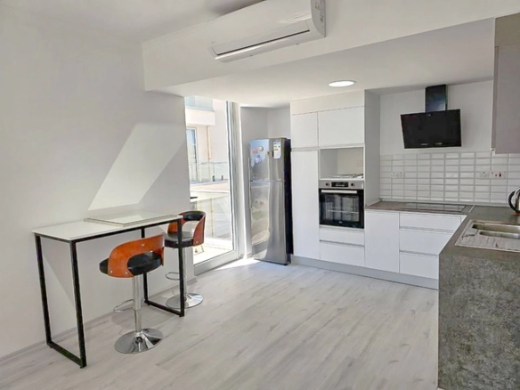 Fully furnished 2 bedroom apartment for sale Bogaz, Iskele, North Cyprus with mountain views, pools and walking distance to the beach.